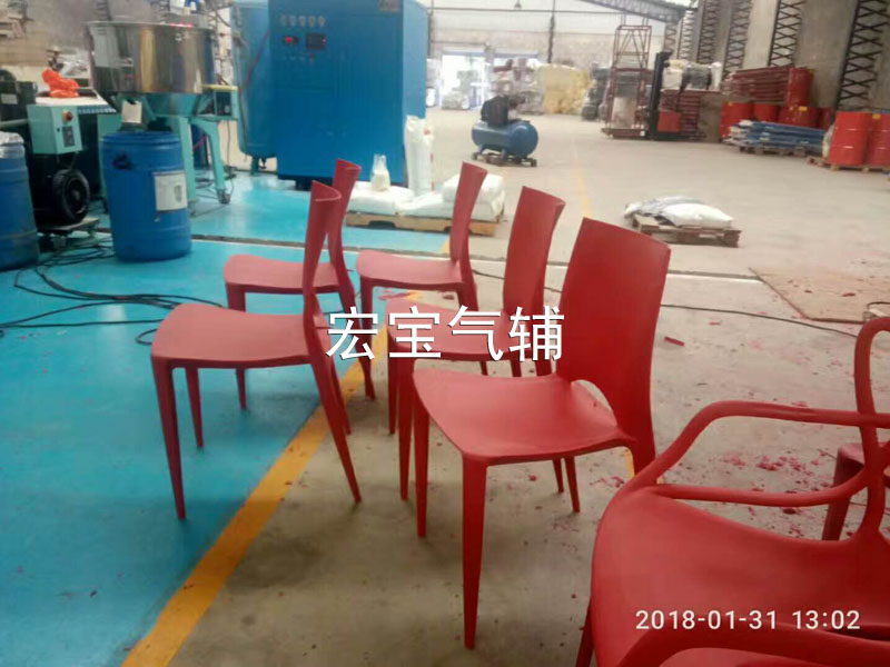 Gas-assisted plastic chair